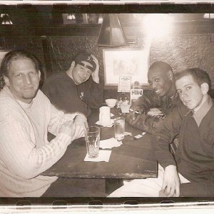 Barry Katz with clients Jeffrey Ross, Jordan Rubin, and Dave Chappelle at the Olive Tree Cafe above the Comedy Cellar in Greenwich Village in New York City.